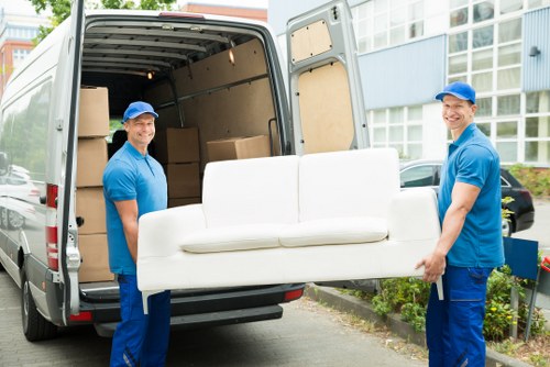 Removal team preparing boxes during a Holland Park move
