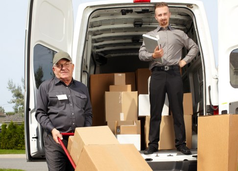 Man and van removal team preparing a move in Holland Park