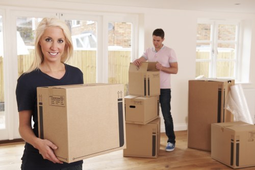 Packing materials and organised household items prepared for a Holland Park move