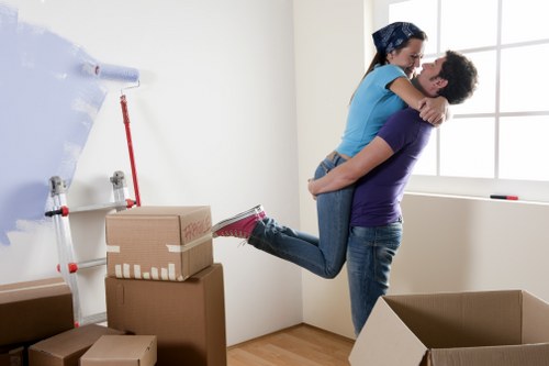 Careful loading of boxes and household items into a van
