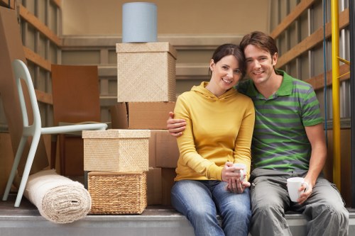 Packed boxes and household items loaded into a removal van