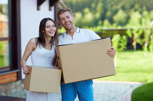 Packed boxes and furniture loaded into a removal truck