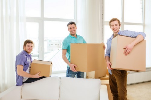 Local house moving team preparing a truck for a Holland Park relocation