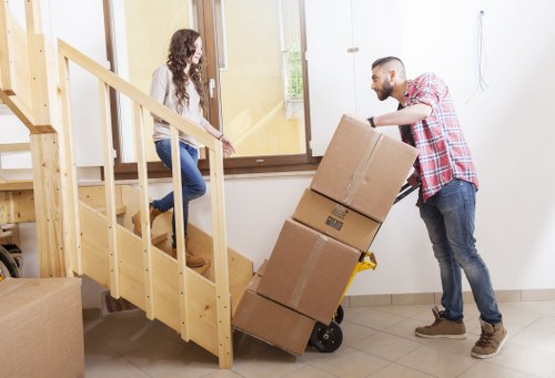 Team checking labour standards in removal services