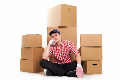 Packed household boxes ready for house removals in Holland Park